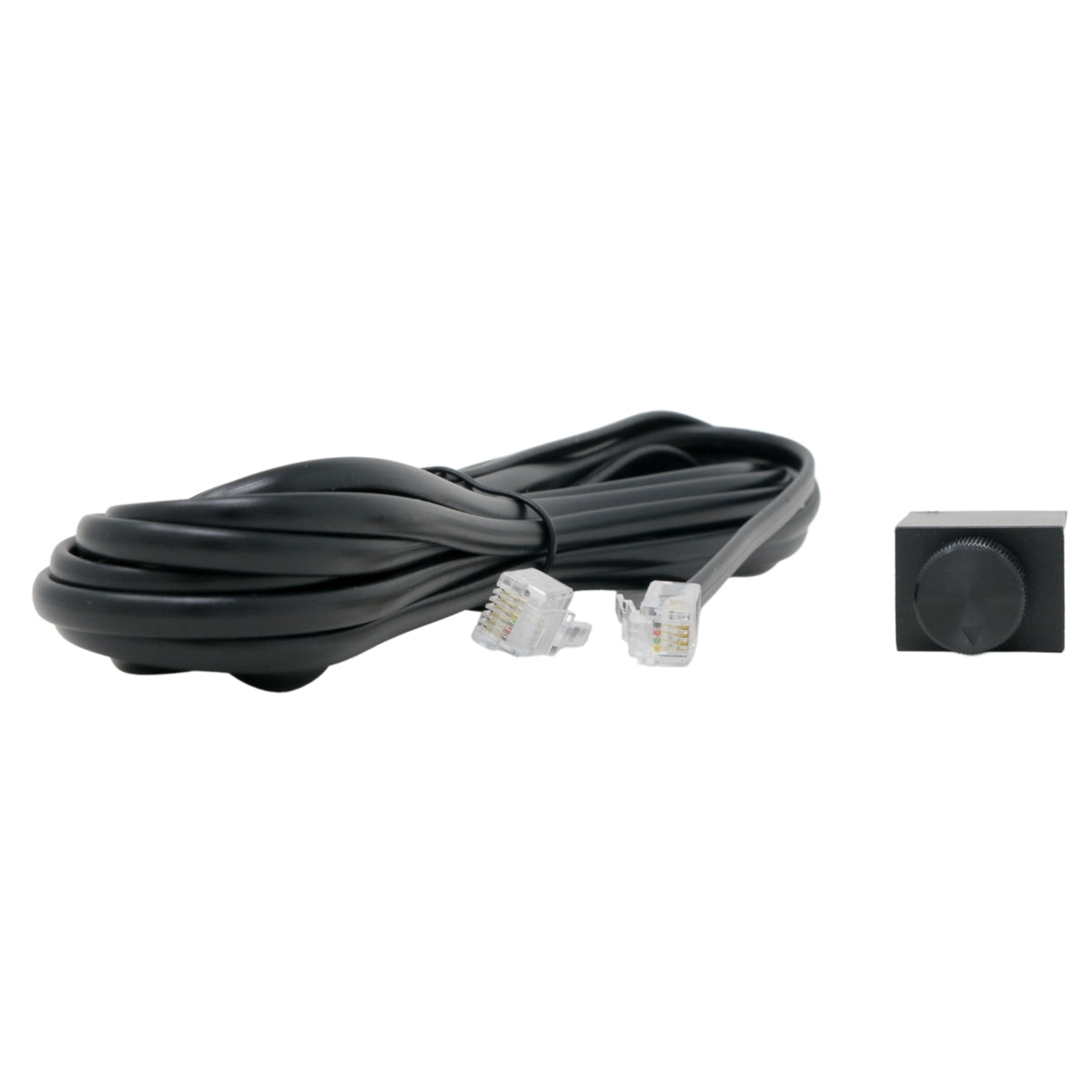 A coiled black cable with two clear RJ12 connectors is placed next to a small black rectangular device with a single round knob on its face. The cable's connectors display visible wiring, suggesting its use for communication or control purposes. The device appears to be part of a Cerwin Vega Inc. HED 1000W RMS Class-D Mono Digital Amplifier system.
