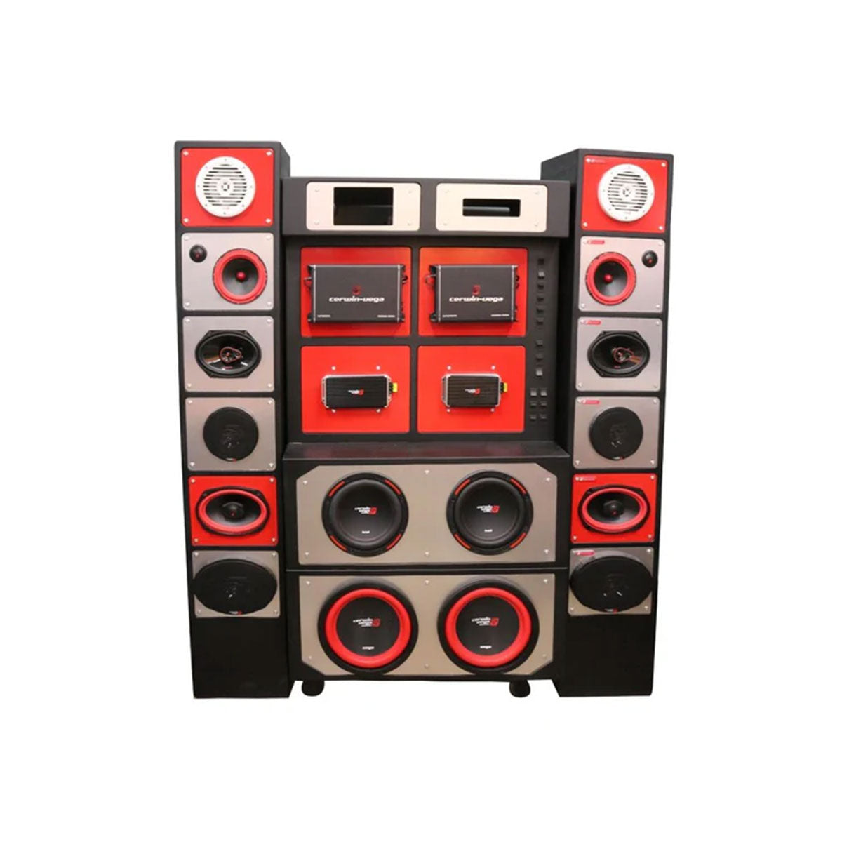 The Cerwin-Vega Mobile Display is a large car audio system with multiple speakers and subwoofers in a rectangular frame. It features a bold red and black color scheme, circular speakers, and rectangular amplifiers, creating an eye-catching pattern.