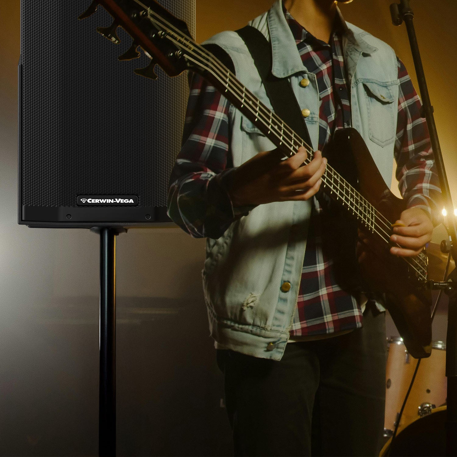 Guitarist using Cerwin-Vega speakers