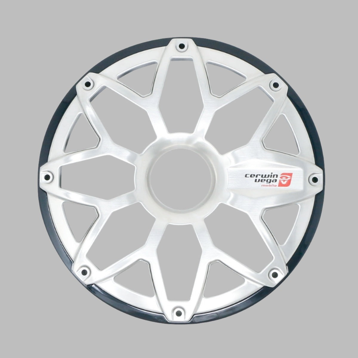 Silver wheel cover mimicking the "RPM Stroker 6.5” Flush Mount Speaker Grill," with a star-shaped spoke design, black outer rim, and "Cerwin Vega" logo. Its ten spokes feature triangular cutouts near the center on a plain gray background.