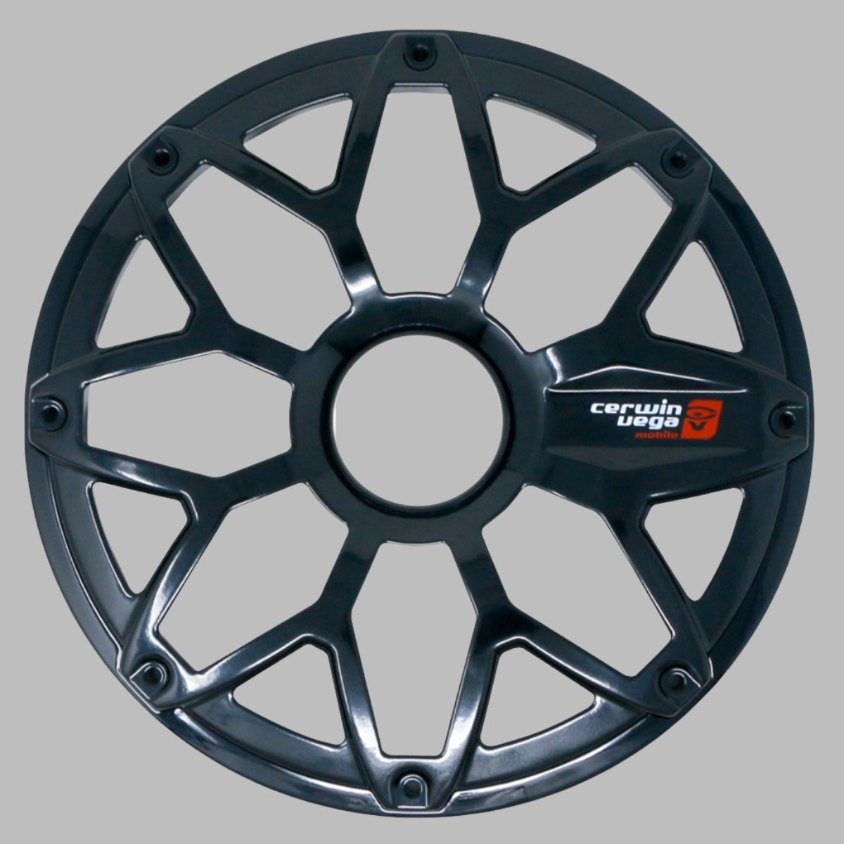 A black, glossy, multi-spoke wheel cover with a central hub resembles the RPM Stroker 8” Flush Mount Speaker Grill. The design merges angular and rounded edges elegantly. A small red and white "cerwin vega" logo is positioned on the right metallic strip against a plain gray background.