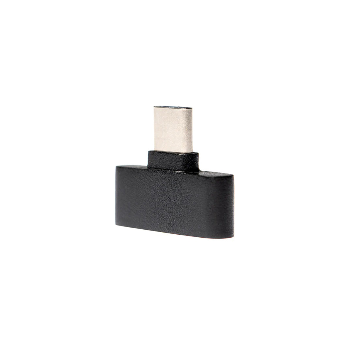 The CASSANDRA | USB-C Transmitter - PL5575 features a sleek black design with a metallic connector tip on its compact plastic body, set against a white background. It stands vertically, offering universal compatibility for seamless connections.