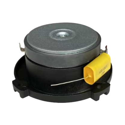 A black circular CVPX1 bullet horn tweeter with a metallic top sits on a round base, resembling precise horn-loaded drivers. A yellow cylindrical capacitor with a metal wire extends outward. The tweeter features three mounting tabs for installation against the plain white background.