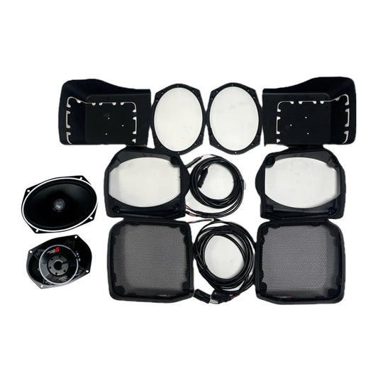 The Cerwin Vega 1998-2013 Harley Davidson® Cut-In Lid Kit with ST69CX (4Ω) - RPMST694LK13 includes coax speakers, oval designs with mesh covers, black wiring coils, and padded components. It comes with all the necessary hardware for an easy audio upgrade to your Harley Davidson.