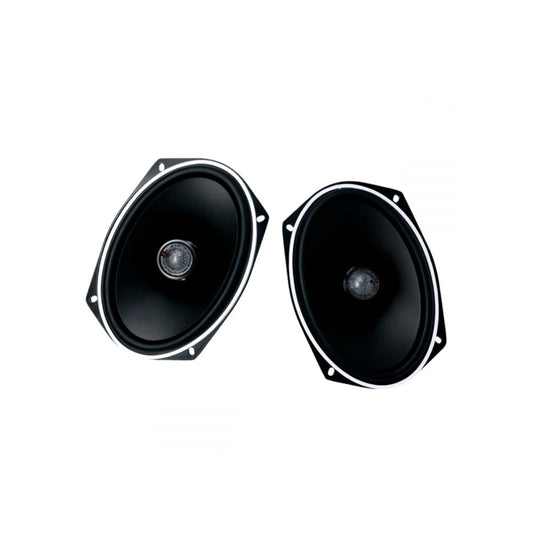 The Stroker Pro Coaxial displays two oval-shaped black speakers with silver rims against a white backdrop. Each speaker features a central dome surrounded by a cone for audio output, and four corner mounting holes for easy installation.