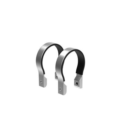 Displayed against a white background are two 1.5" black and silver C-shaped metal brackets from the 4-piece CL150B set, designed as replacement clamps with flat bases featuring screw holes for easy mounting. The interiors are anodized in sleek black while the exteriors gleam in silver.