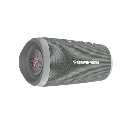 The VegaMini is a portable, cylindrical gray Bluetooth speaker with a textured mesh surface and a white Cerwin-Vega logo. It features a top button panel, circular side sound output area with red logo at center, delivering an immersive audio experience.