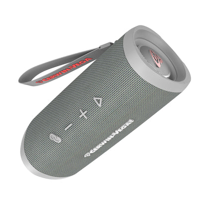 The VegaMini - Compact Powerhouse Bluetooth Speaker, with a gray woven texture and brand logo, flaunts a cylindrical design. It offers immersive sound, featuring power, volume, and play/pause buttons, along with a red-trimmed strap for carrying. A circular grille completes its true wireless stereo setup.