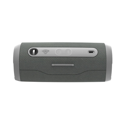 The VegaMini Bluetooth speaker, with its gray fabric mesh exterior and cylindrical design, provides immersive sound. It features top-panel buttons for power, Bluetooth, and volume control, plus a charging port. Smooth edges with light-colored caps enhance its sleek design.