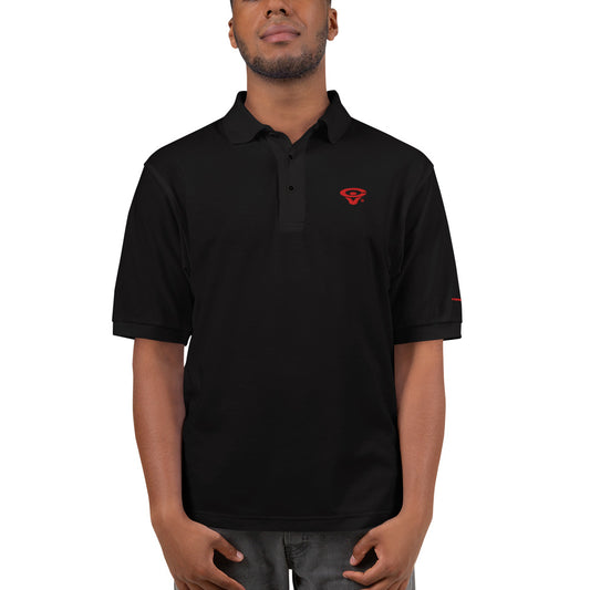 A person in a black Cerwin-Vega Logo Polo Shirt with a red stylized eye logo on the chest stands against a white background. The breathable shirt features a classic collar and button placket. With hands at their sides, they pair it with dark pants.