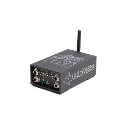 A SKAA Transmitter from Dillinger Labs, in black, is shown. It has four numbered circular input/output ports (1-4) on the front panel and a green power button labeled "T zgnzi." The device features a small antenna, with the brand name prominently displayed on the top and side.